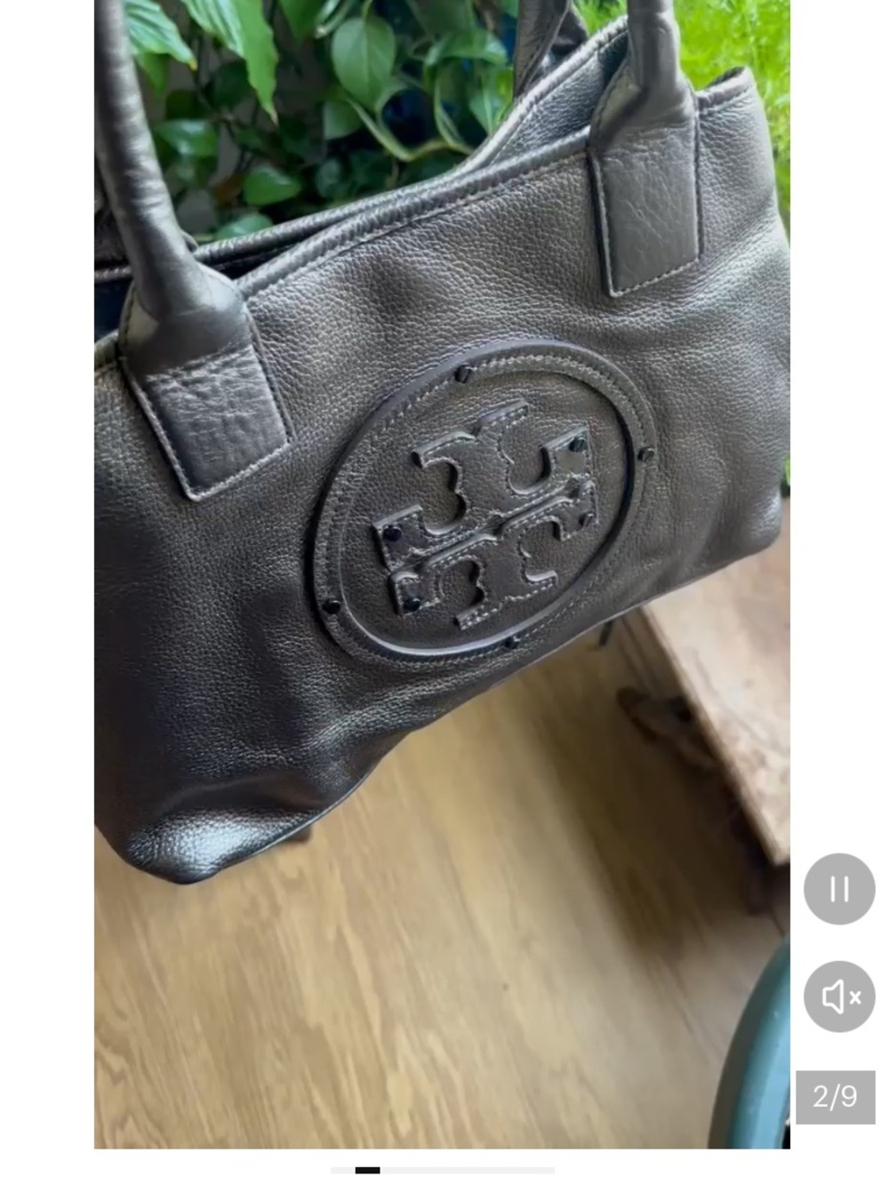 Metallic Tory Burch hand bag in excellent condition. No rips, tears and clean.